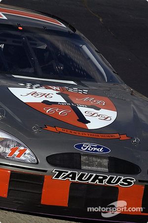 Brett Bodine's car has a special paint scheme marking the 10th aniversary of the loss of Winston Cup