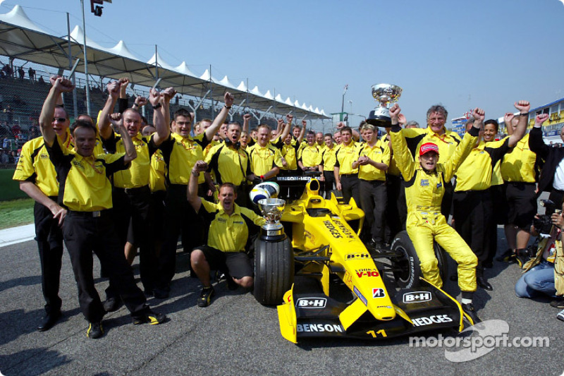 Giancarlo Fisichella and team Jordan celebrate Brazilian GP win