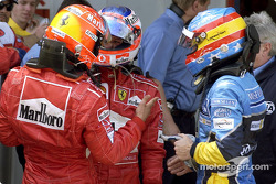 Yarış galibi Michael Schumacher ve Rubens Barrichello ve Fernando Alonso