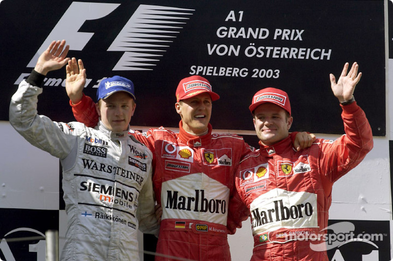 Podio: ganador de la carrera Michael Schumacher, segundo lugar Kimi Raikkonen y tercer lugar Rubens 