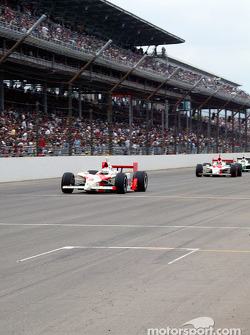 Under yellow: Gil de Ferran and Helio Castroneves