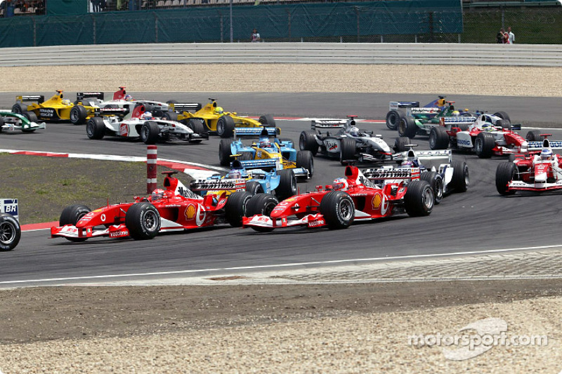 The start: Michael Schumacher and Rubens Barrichello lead the field