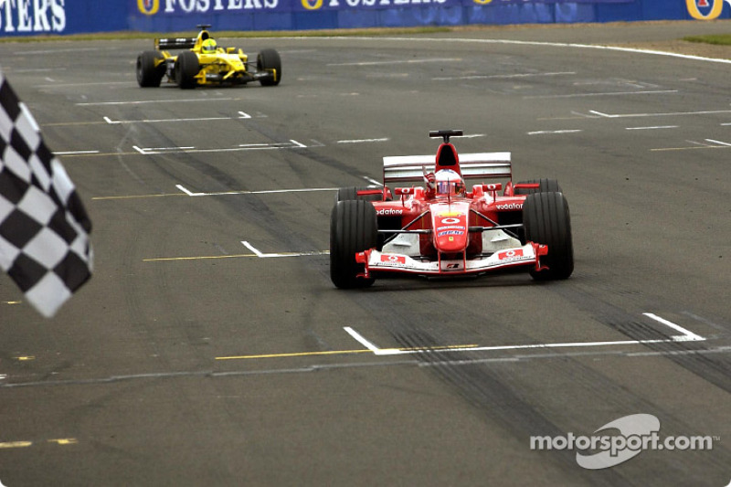 Rubens Barrichello takes checkered flag