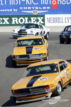 The corkscrew at Laguna Seca gets crowded during the first lap of the Historic Trans-Am race