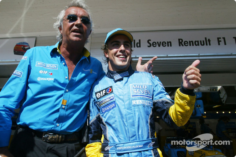 Flavio Briatore and Fernando Alonso celebrate pole position