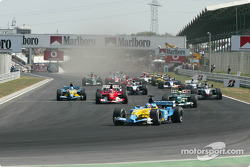Start: Fernando Alonso leads the field