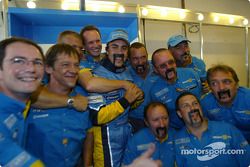 Fernando Alonso celebrates win with Renault F1 team members