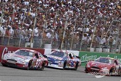 Kurt Busch leads Todd Bodine and Ricky Rudd