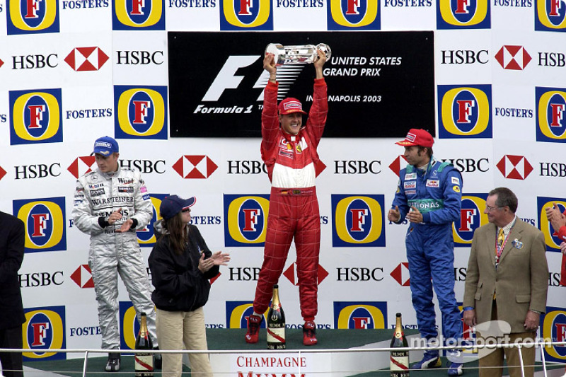 Podio: ganador de la carrera Michael Schumacher, segundo lugar Kimi Raikkonen y tercer lugar Heinz-H