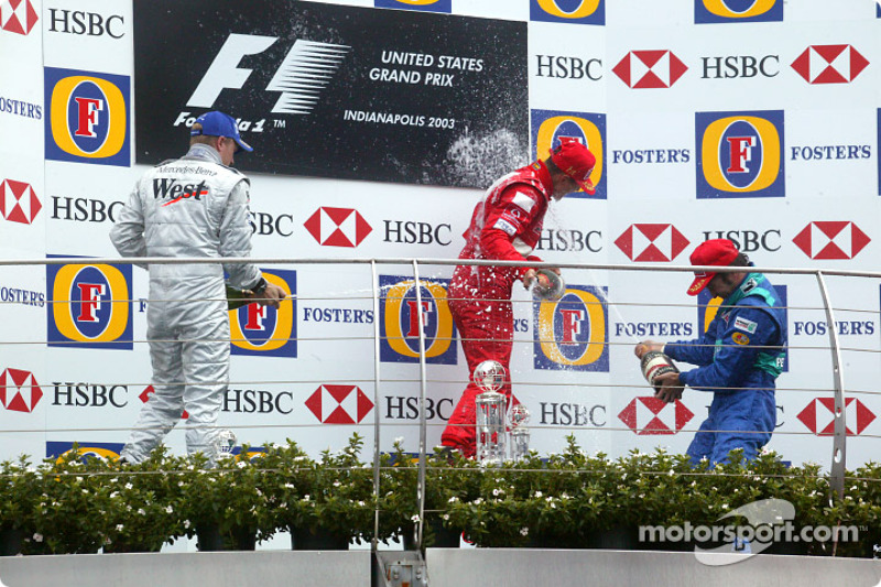 Podio: ganador de la carrera Michael Schumacher, segundo lugar Kimi Raikkonen y tercer lugar Heinz-Harald Frentzen