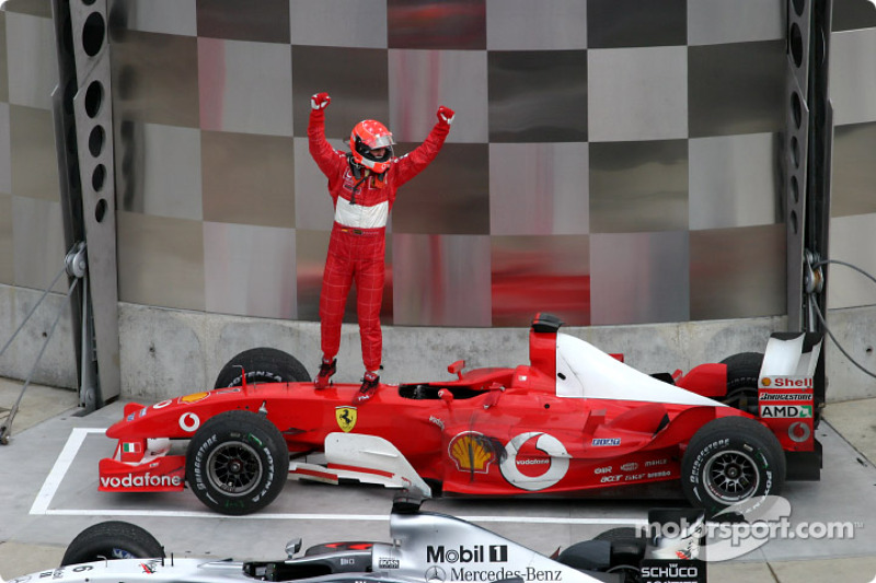 Race winner Michael Schumacher celebrates