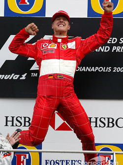 Race winner Michael Schumacher celebrates