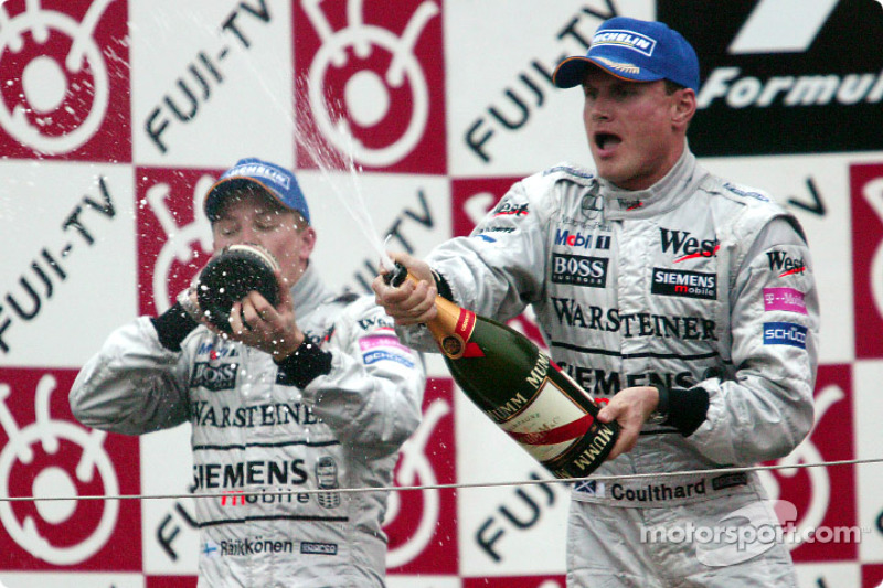 David Coulthard and Kimi Raikkonen celebrate