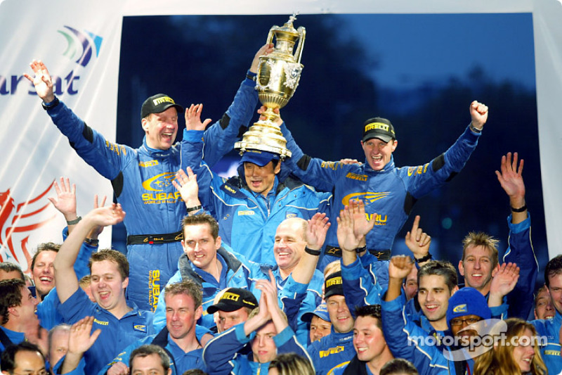 Petter Solberg and co-driver Phil Mills celebrate WRC title with the Subaru World Rally Team