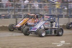 California's Thomas Meseraul (13) and Danny Lasoski (20) pace Wednesday night's 25-lap qualifying feature at the 18th Annual O'Reilly Chili Bowl Nationals