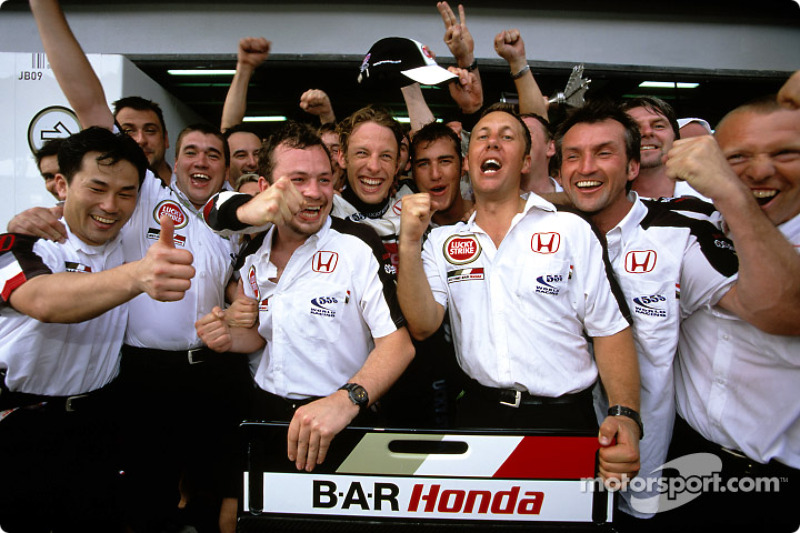 Jenson Button celebrates with his team