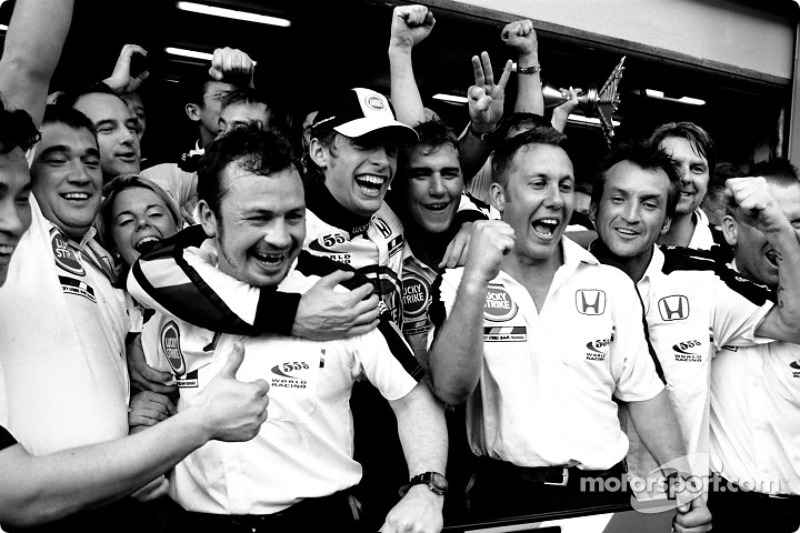 Jenson Button celebrates with his team
