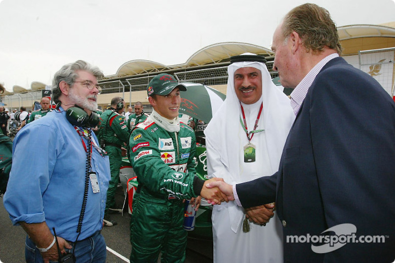 Le réalisateur George Lucas, Christian Klien et le Roi Juan Carlos d'Espagne sur la grille de départ