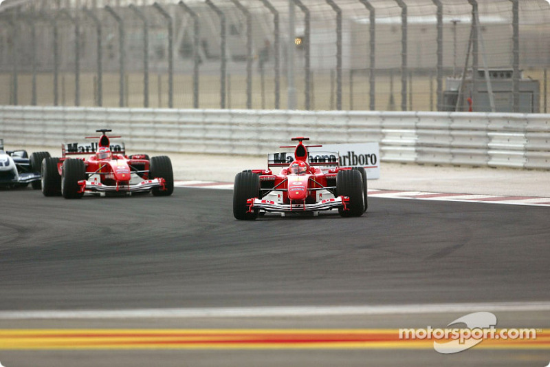 Michael Schumacher, Ferrari F2004; Rubens Barrichello, Ferrari F2004