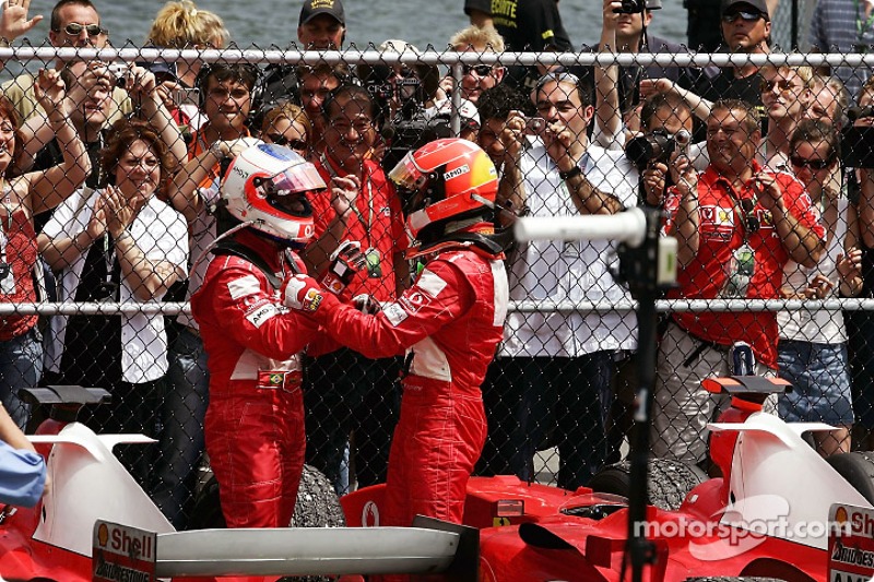 Michael Schumacher and Rubens Barrichello celebrate