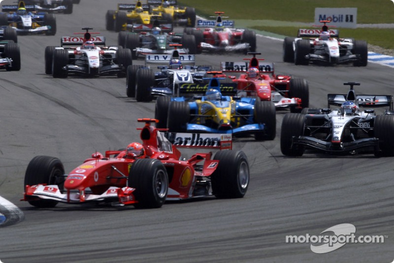First corner: Michael Schumacher ve field