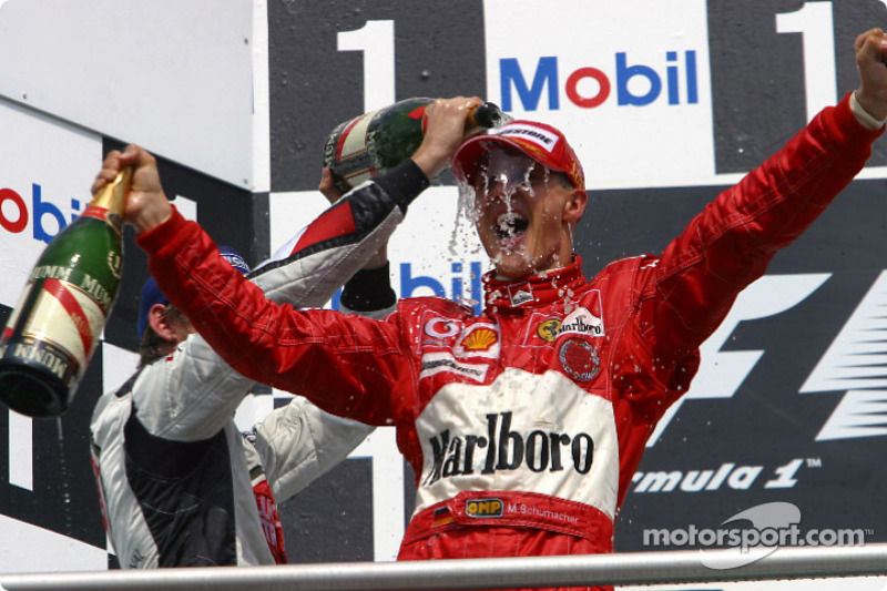 Podium: champagne for Michael Schumacher