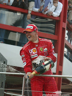 Podium: champagne for Michael Schumacher
