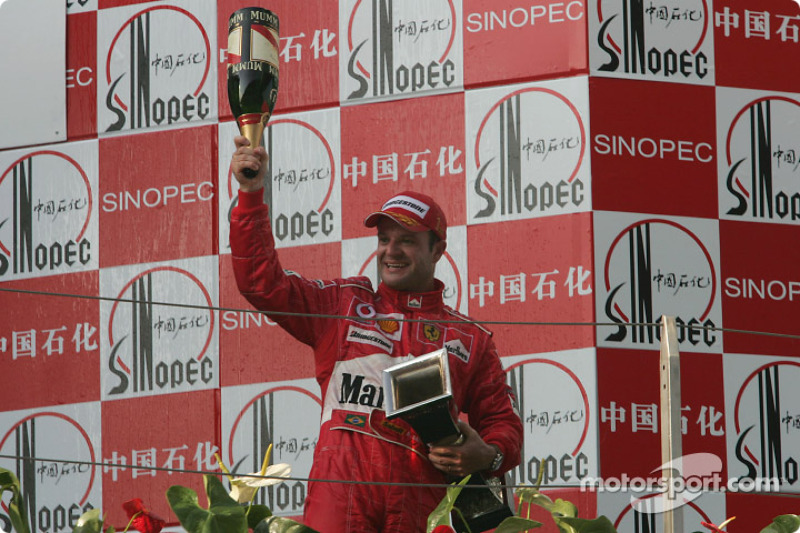 Podium: race winner Rubens Barrichello celebrates