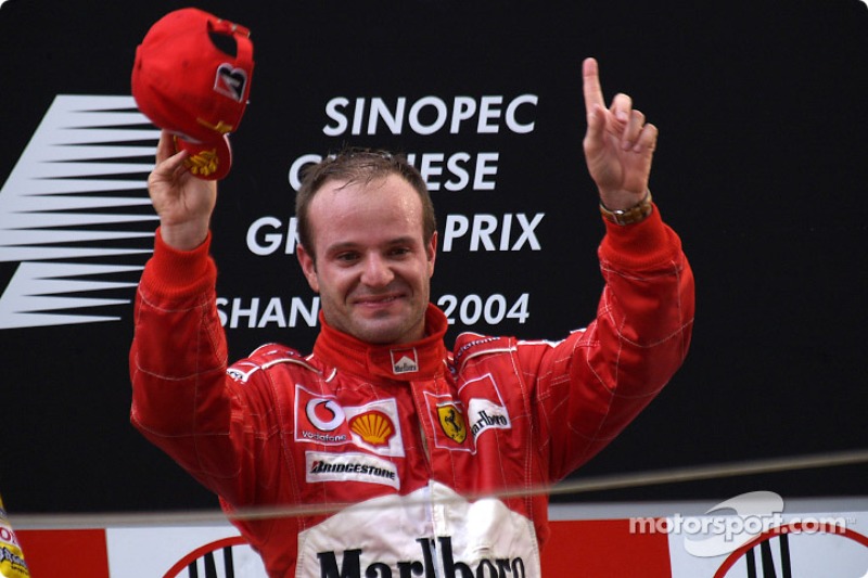 Podium: race winner Rubens Barrichello celebrates