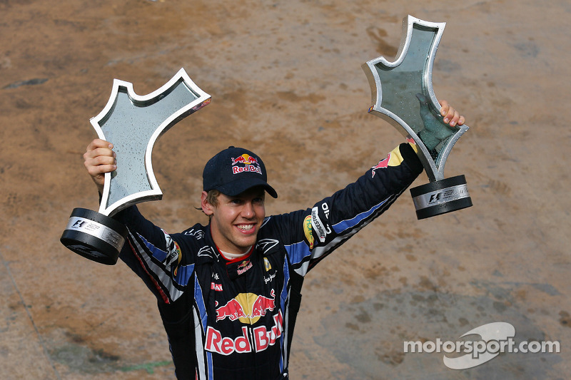 Race winner Sebastian Vettel, Red Bull Racing with his team