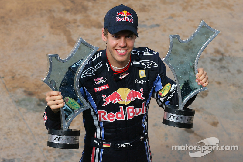 Race winner Sebastian Vettel, Red Bull Racing with his team