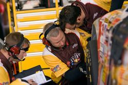 Dave Rogers and the No. 18 crew look over the car