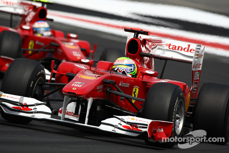 Felipe Massa, Scuderia Ferrari leads Fernando Alonso, Scuderia Ferrari