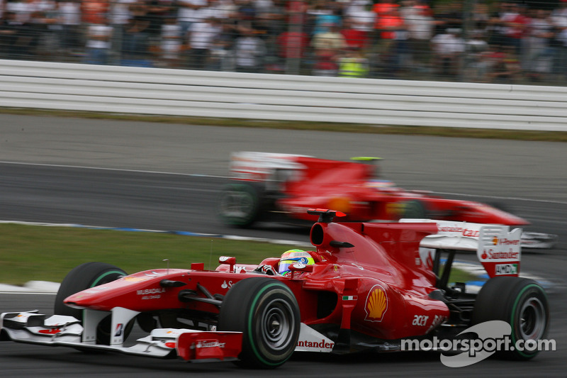 Felipe Massa, Scuderia Ferrari leads Fernando Alonso, Scuderia Ferrari