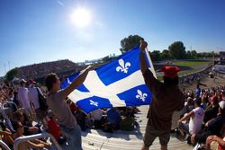 Fans cheer as Jacques Villeneuve passes Marcos Ambrose for second place