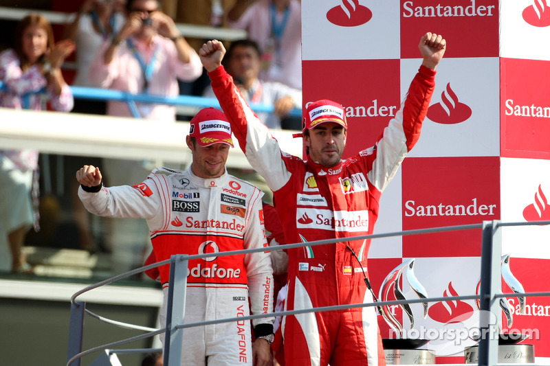 Podium: race winner Fernando Alonso, Scuderia Ferrari, second place Jenson Button, McLaren Mercedes