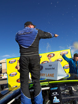 Victory lane: race winner Greg Pursley celebrates