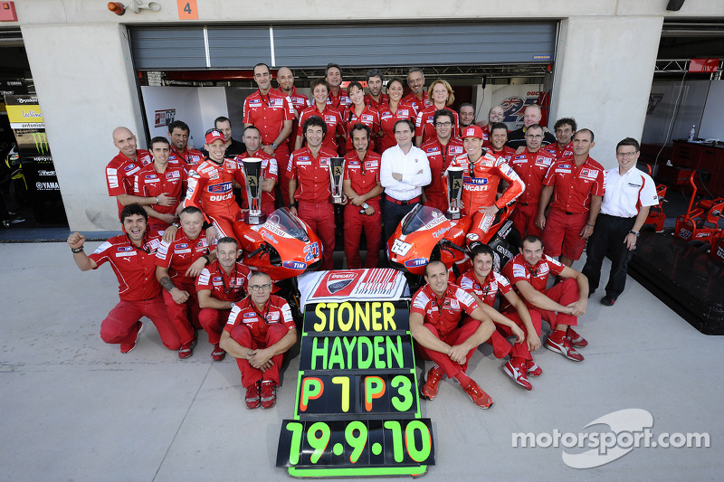 Race winner Casey Stoner, Ducati Marlboro Team, celebrates with Nicky Hayden, Ducati Marlboro Team a