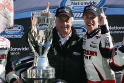 NASCAR Nationwide Series 2010 champion Brad Keselowski celebrates with Roger Penske