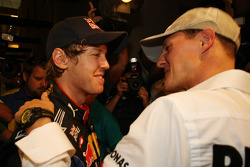 Michael Schumacher, Mercedes GP congratulates Sebastian Vettel, Red Bull Racing