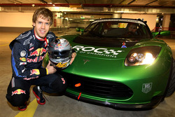Sebastian Vettel with the Tesla