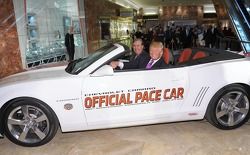 Donald Trump settles into his new ride as the 2011 Indianapolis 500 Chevrolet Camaro SS Convertible Pace Car driver for the 100th Anniversary of the Indianapolis 500 with Jeff Belskus, CEO, Indianapolis Motor Speedway (L)