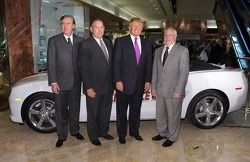 Donald Trump (2nd R) accepts the keys to the Indianapolis 500 Chevrolet Camaro SS Convertible Pace Car from Allen Sirkin, President and Chief Operating Officer, Phillips-Van Heusen (L) ,Jeff Belskus, CEO, Indianapolis Motor Speedway (2n L) and Jeff Chew, 