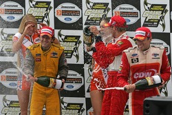 Podium: champagne for Sébastien Bourdais, Cristiano da Matta and Justin Wilson