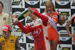 Podium: champagne for Sébastien Bourdais, Cristiano da Matta and Justin Wilson