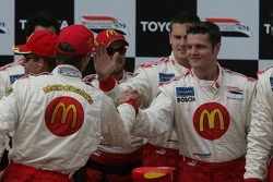 Podium: race winner Sébastien Bourdais celebrates