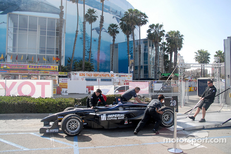 Pacific Coast Motorsports team unloads Alex Figge's car at Long Beach