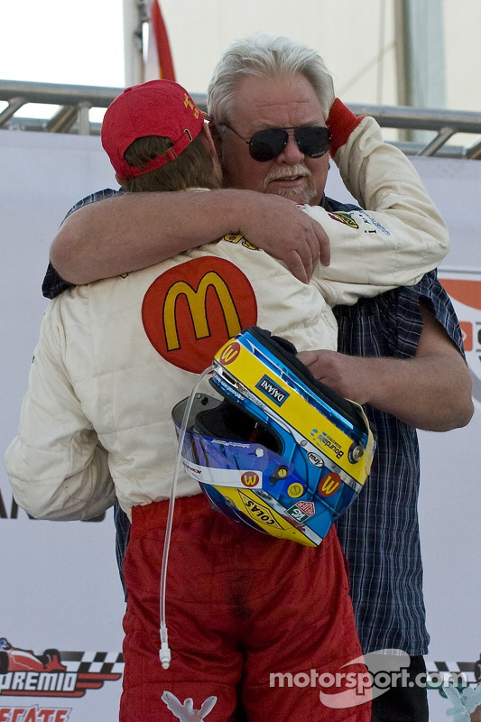 Podium: race winner Sébastien Bourdais celebrates