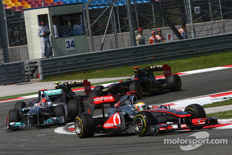 Lewis Hamilton, McLaren Mercedes leads Michael Schumacher, Mercedes GP F1 Team