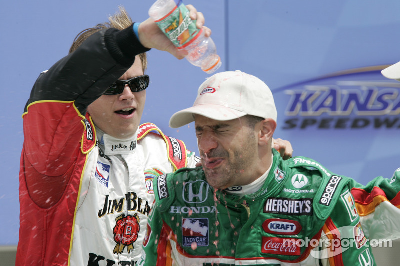 Victory lane: race winner Tony Kanaan celebrates with Dan Wheldon
